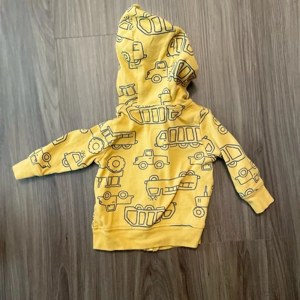 Carter's Yellow Zip-Up Hoodie with Playful Construction Trucks Print size 0-3M